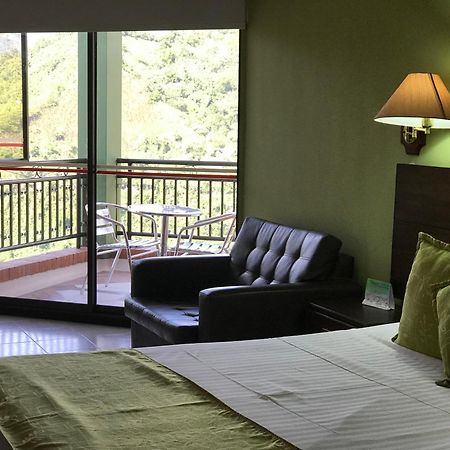 Casa Morales Hotel Internacional Y Centro De Convenciones Ibagué Екстериор снимка A room at the hotel