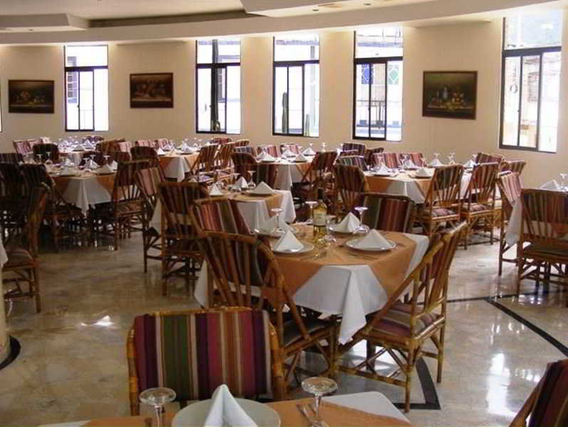Casa Morales Hotel Internacional Y Centro De Convenciones Ibagué Екстериор снимка The dining room at the hotel