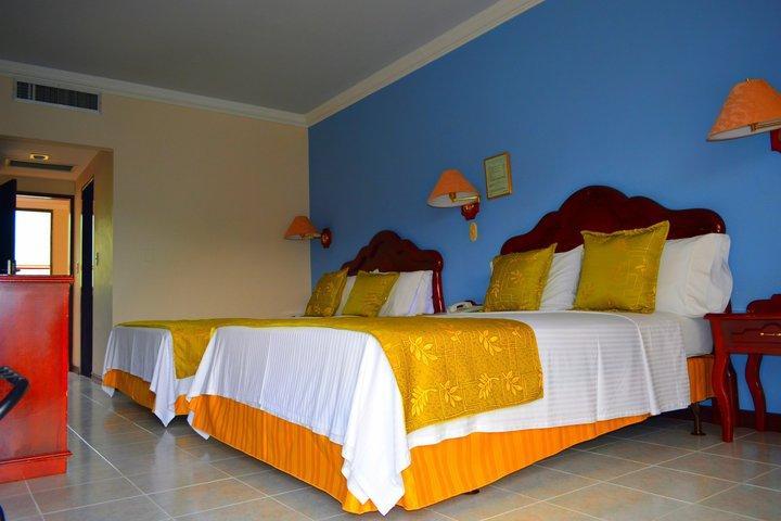 Casa Morales Hotel Internacional Y Centro De Convenciones Ibagué Екстериор снимка A room at the hotel