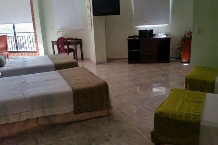 Casa Morales Hotel Internacional Y Centro De Convenciones Ibagué Екстериор снимка A room at the hotel