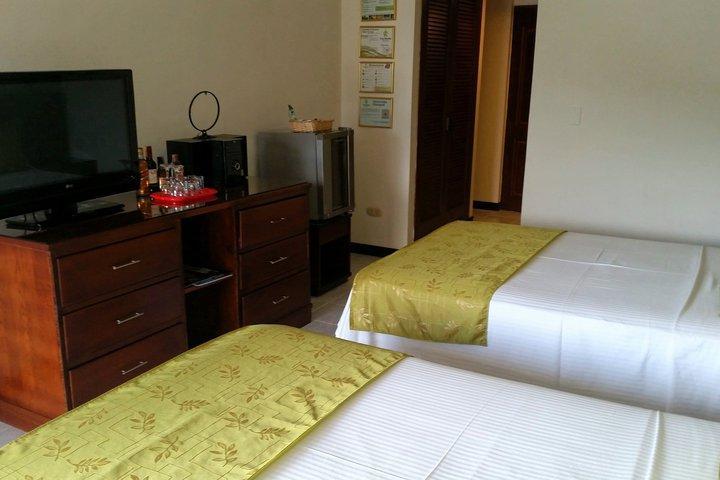Casa Morales Hotel Internacional Y Centro De Convenciones Ibagué Екстериор снимка A room at the hotel