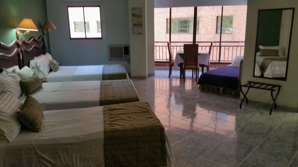 Casa Morales Hotel Internacional Y Centro De Convenciones Ibagué Екстериор снимка A room at the hotel